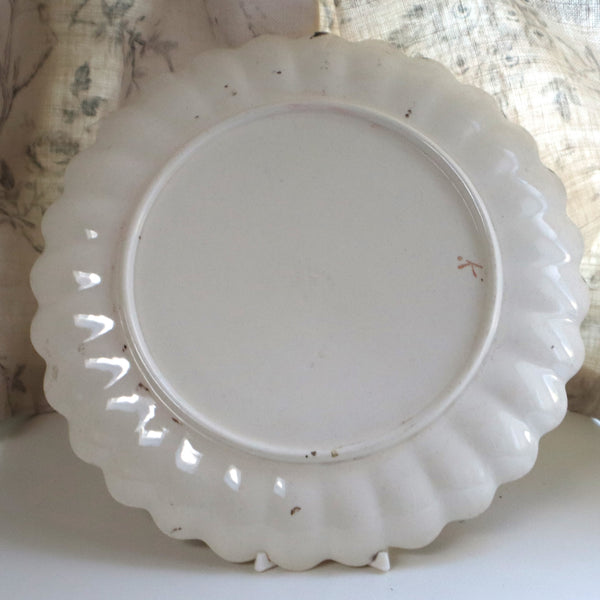 A Scalloped and Hand Painted 1850s Nursery Plate